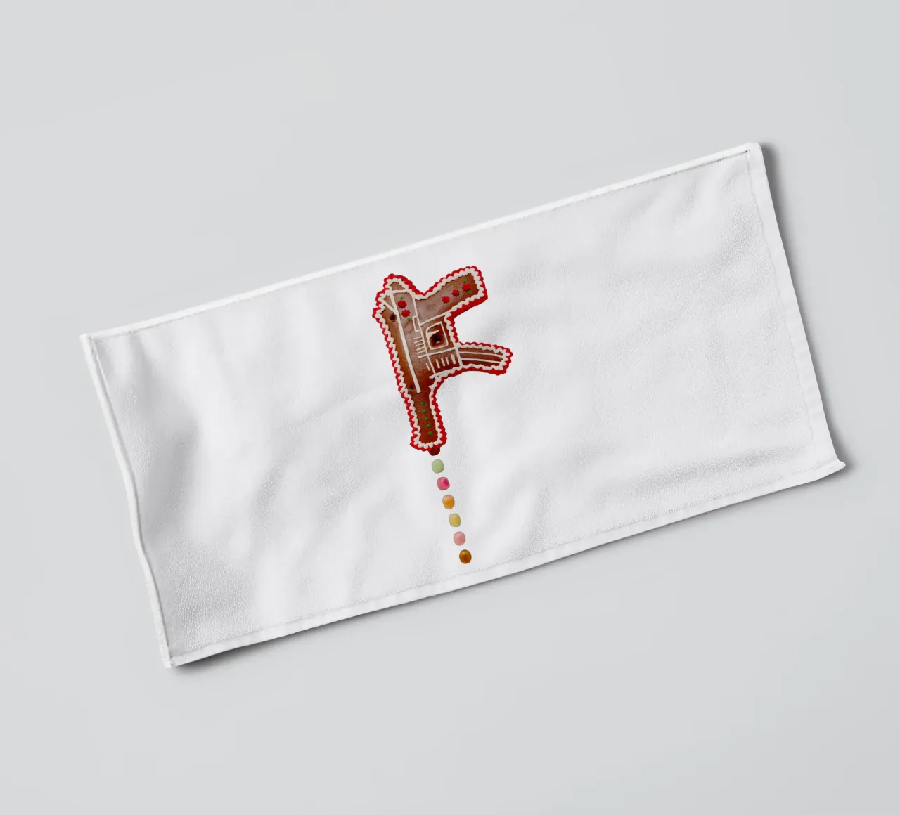 Gingerbread weapon towel by Simon Koy
