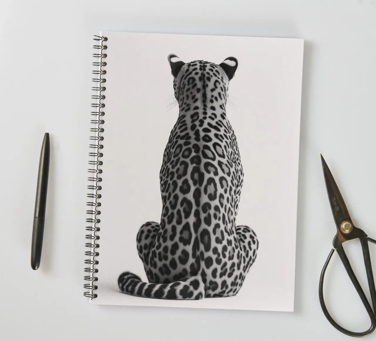 B&W Resting leopard spiral notebook by Carinaprint