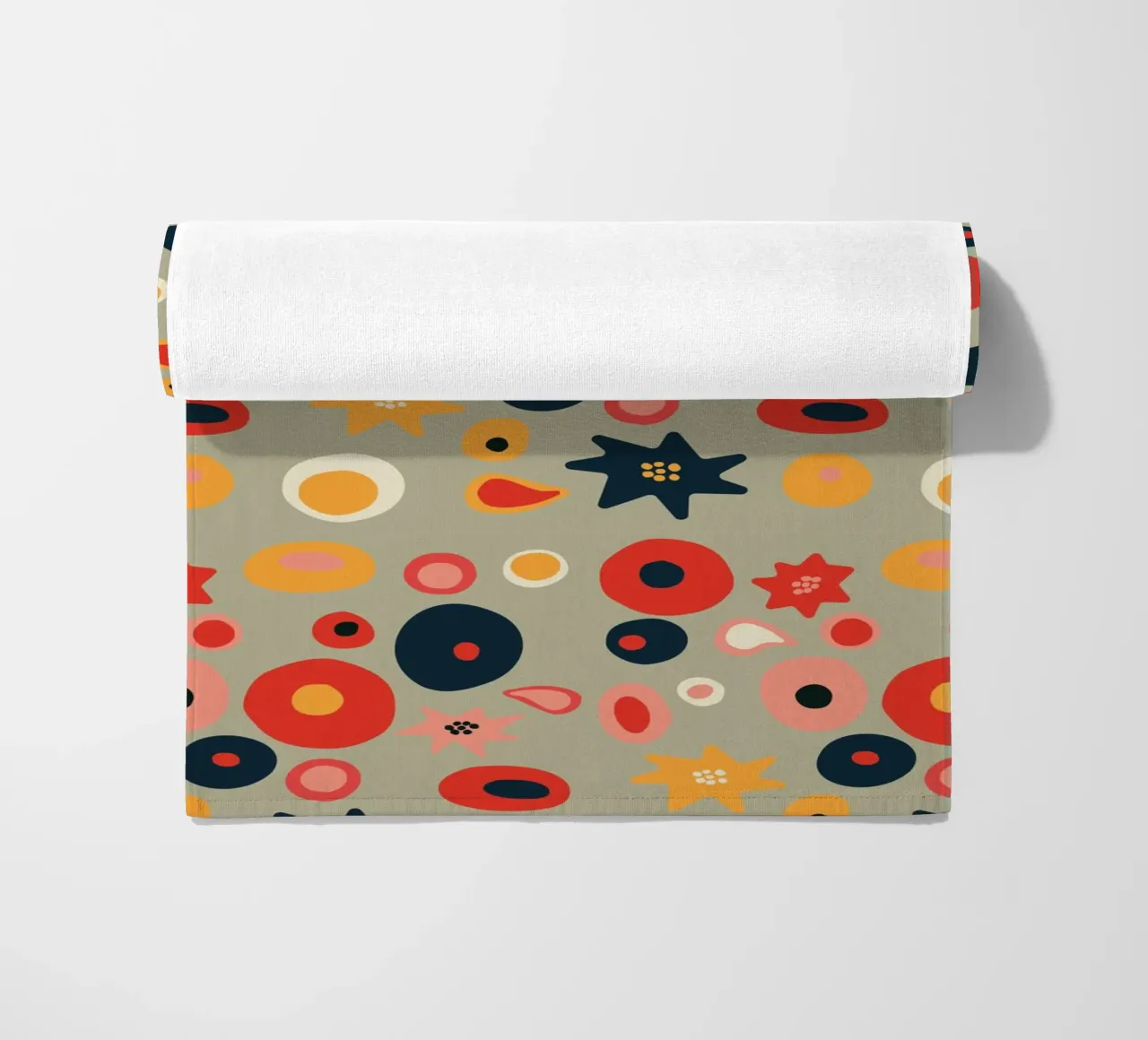 Playful flower and shape pattern in red and gold beach towel by Spunk