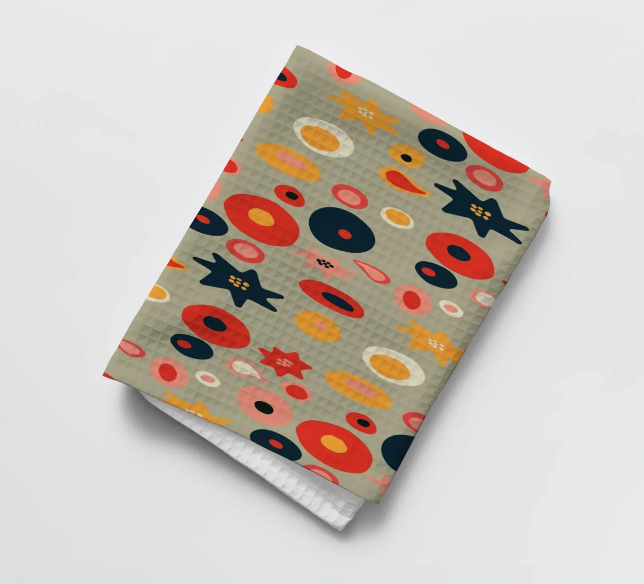 Playful flower and shape pattern in red and gold tea towel by Spunk
