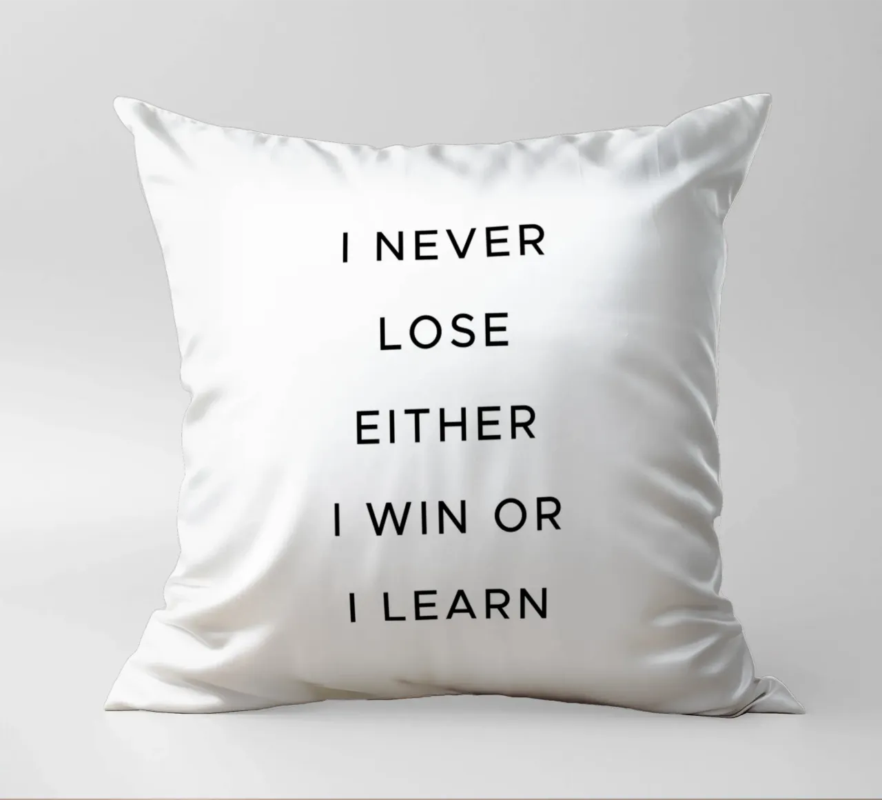 I never lose either I win or I learn quote decorative cushion by Paigaam Studio