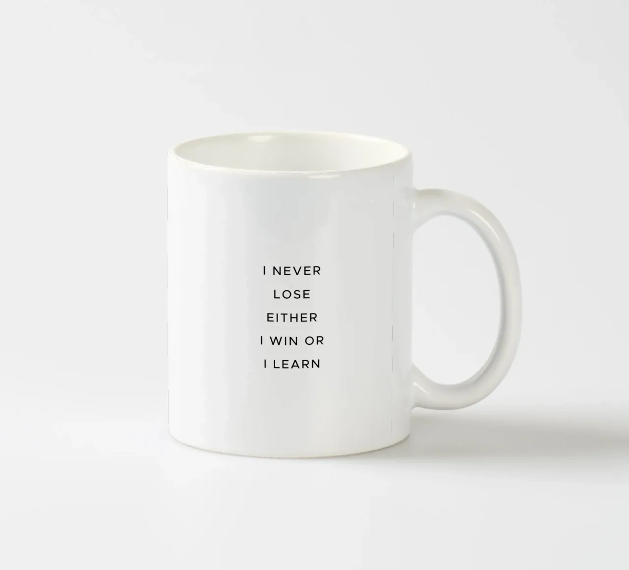 I never lose either I win or I learn quote ceramic mug by Paigaam Studio
