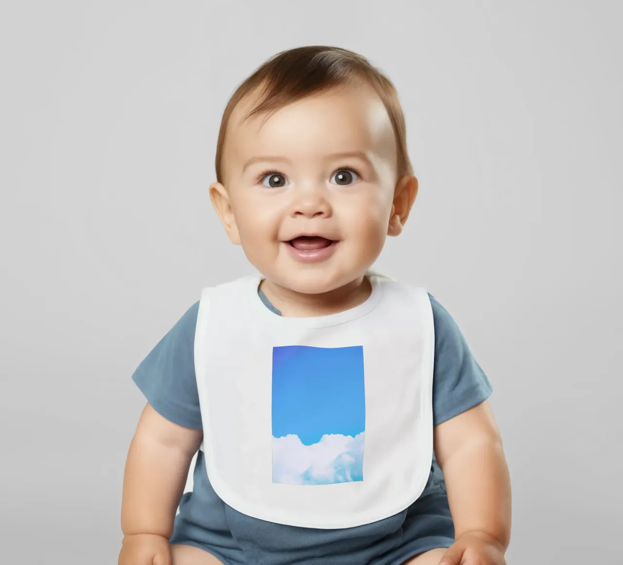 Blue Clouds I baby bib by Tal Paz-Fridman