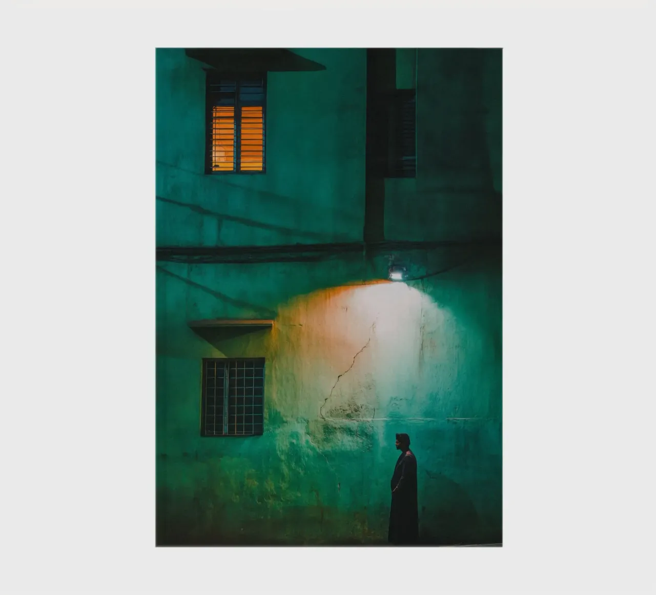 Silhouette and solitude in the shadow of lampposts notebook by By Night