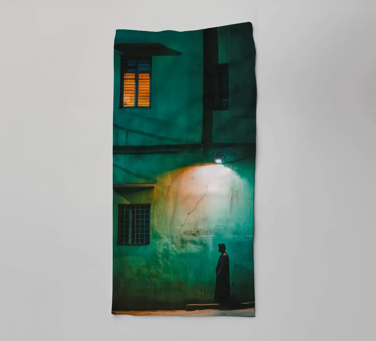 Silhouette and solitude in the shadow of lampposts towel by By Night