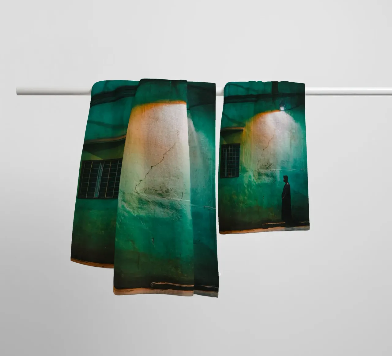 Silhouette and solitude in the shadow of lampposts towel by By Night