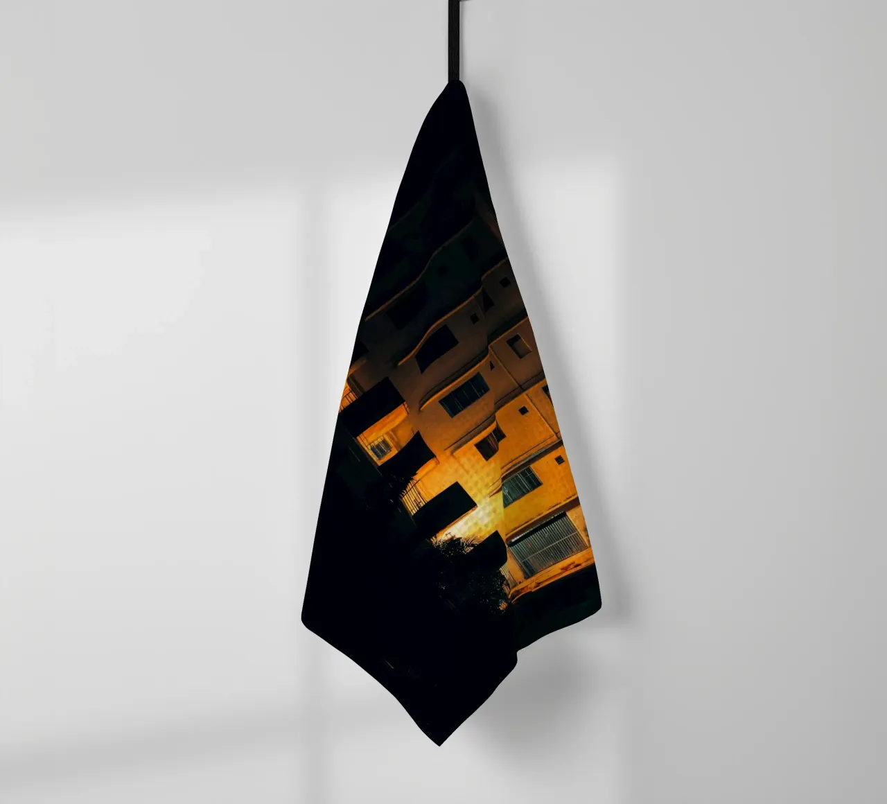 Golden glints in the urban darkness - Madras tea towel by By Night
