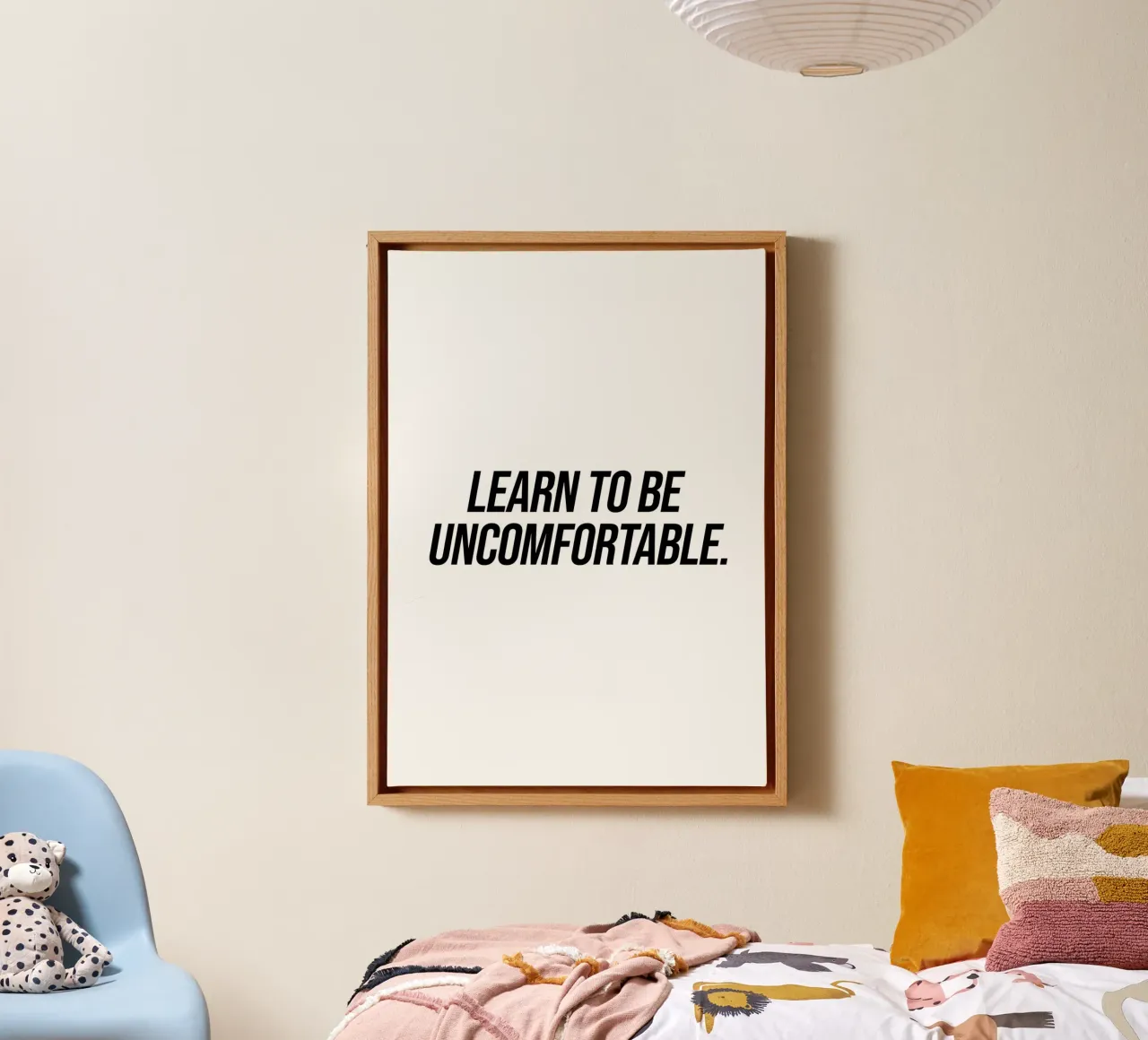 Learn to be uncomfortable quote canvas by Paigaam Studio