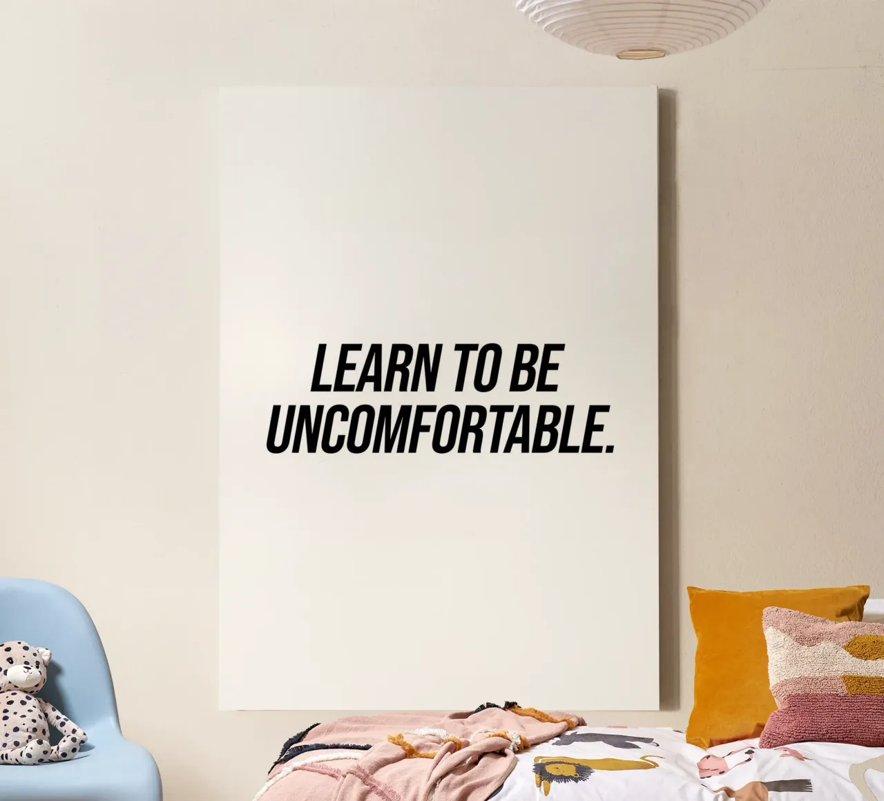 Learn to be uncomfortable quote canvas by Paigaam Studio