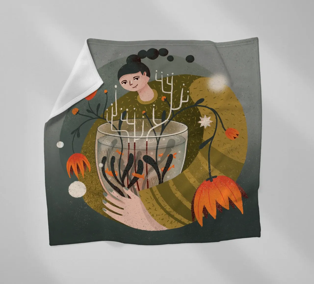 Woman holding a vase with flowers and fish fleece blanket by Bold & Beautiful