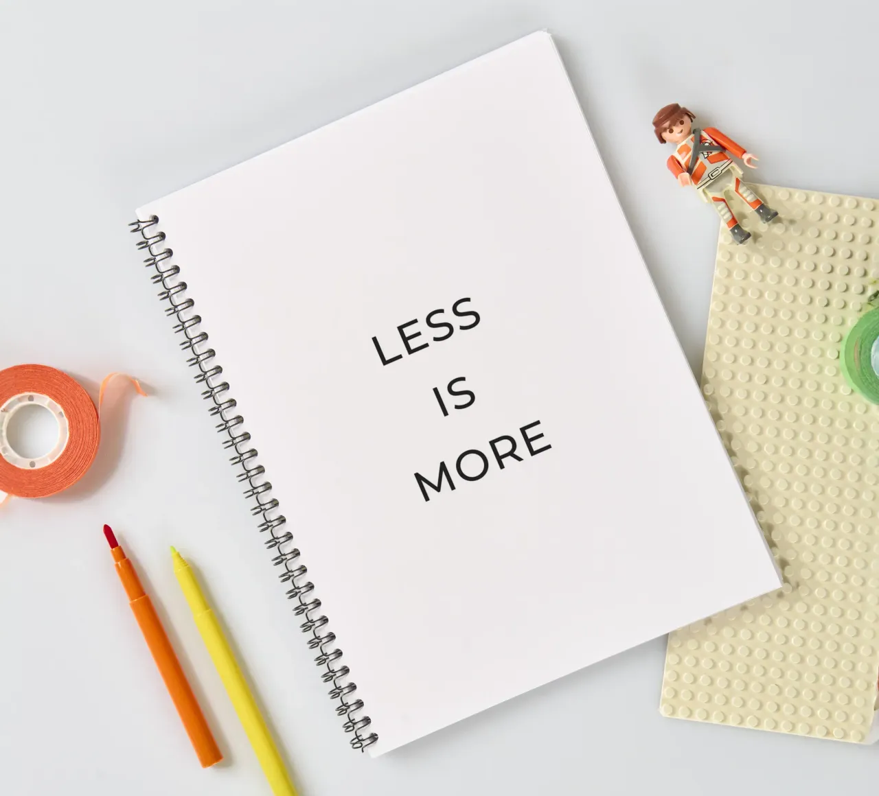 Less is more quote spiral notebook by Paigaam Studio