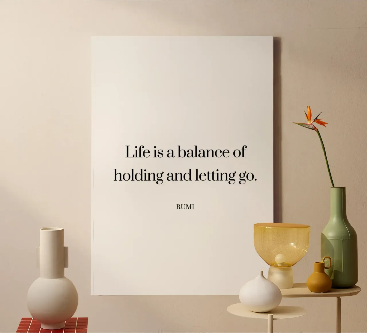 Holding and letteing go quote canvas with Floater frame by Paigaam Studio