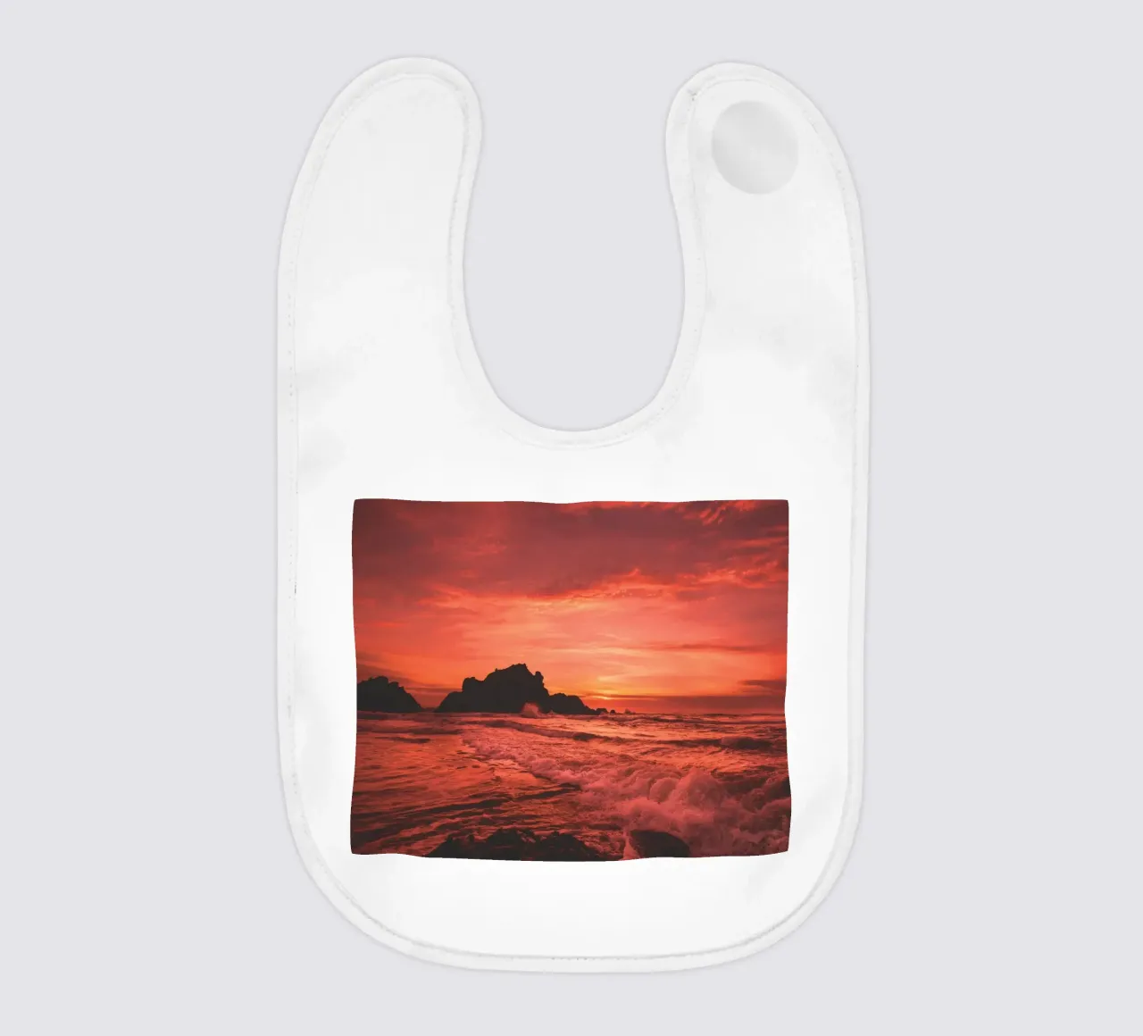 Scarlet Big Sur Sunset baby bib by Dave Hare Photography
