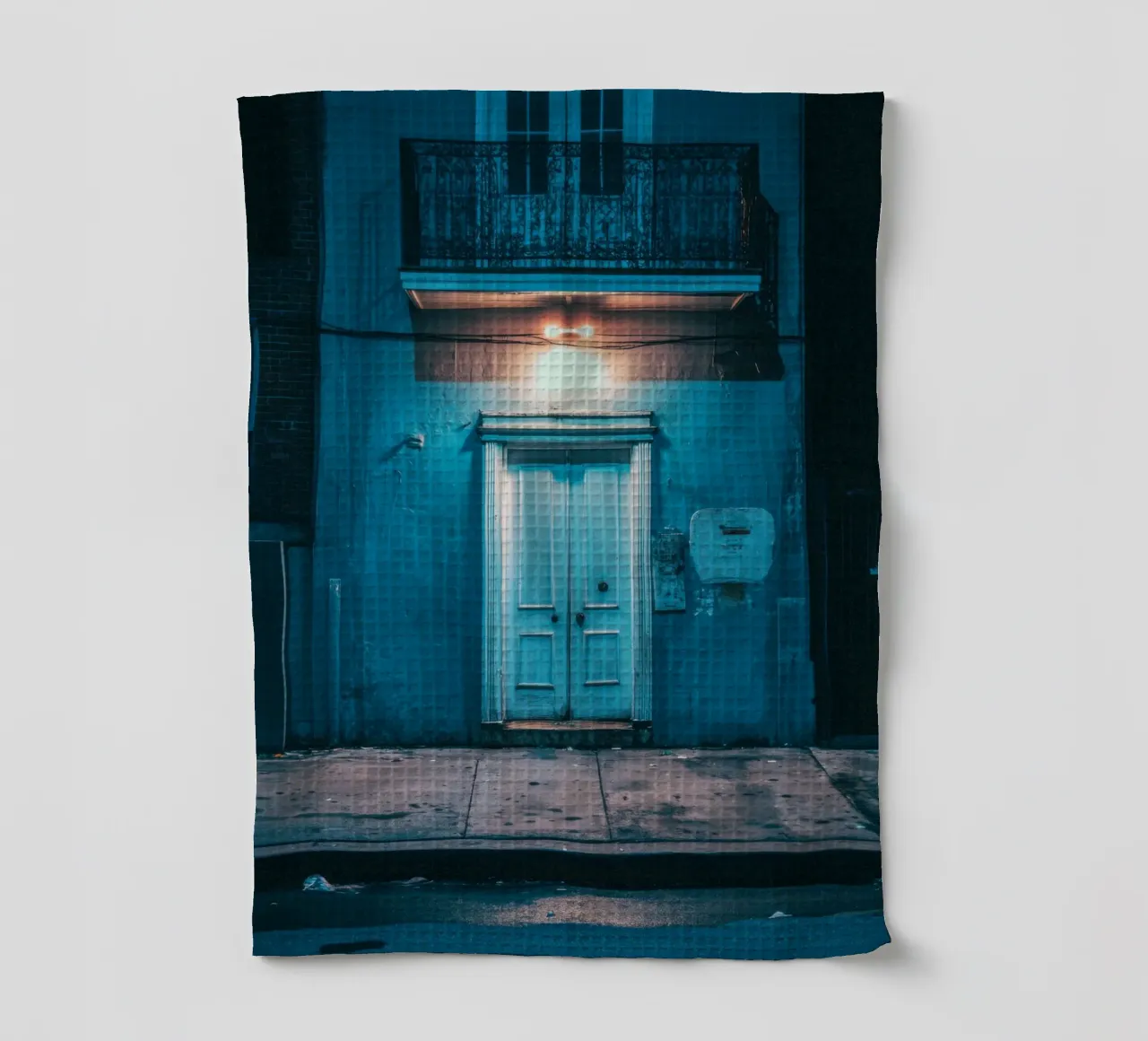 Mysteries of a blue door in New Orleans tea towel by By Night