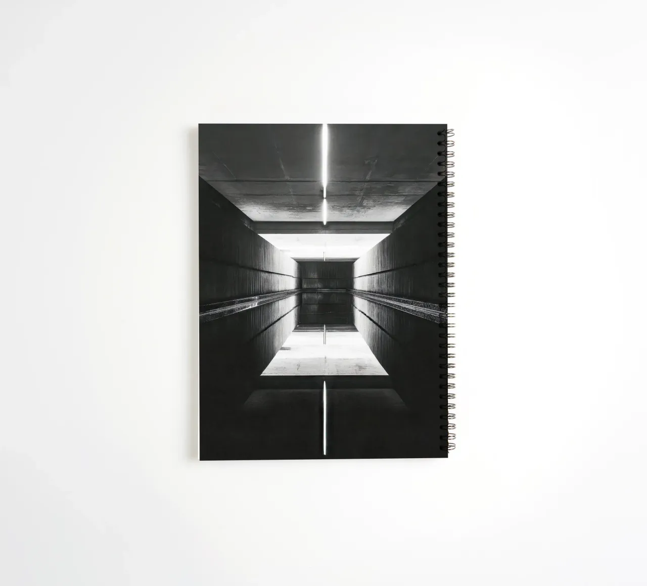 Infinite perspectives in the dark spiral notebook by By Night
