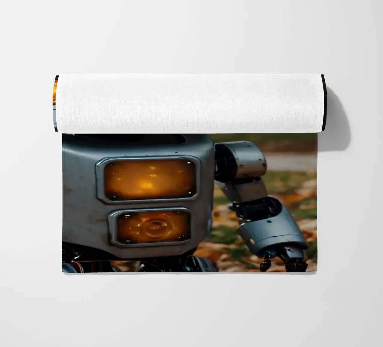 Un robot vintage si trova accanto a una zucca intagliata durante l'autunno telo mare da DesignDoodle