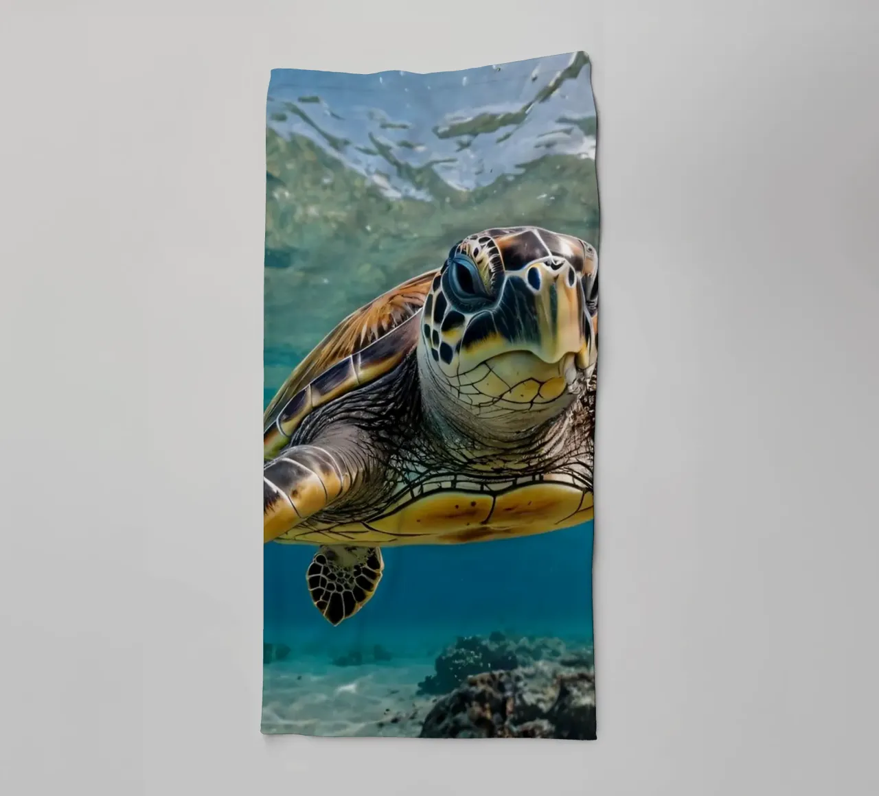 A sea turtle gliding gracefully through clear blue waters towel by DesignDoodle