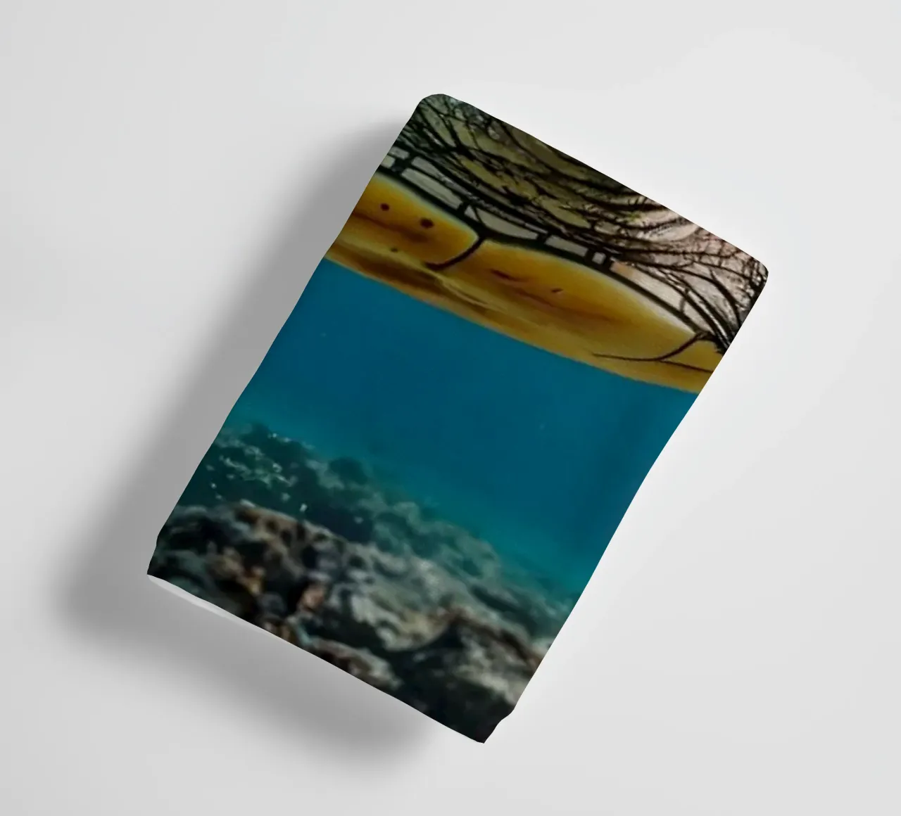 A sea turtle gliding gracefully through clear blue waters towel by DesignDoodle