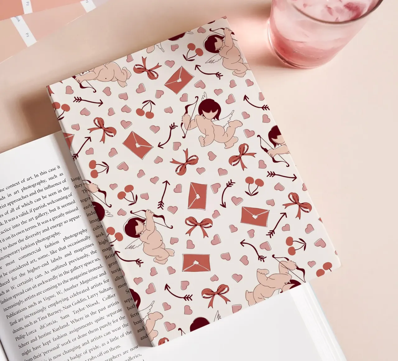 Playful Cherubs Pattern notebook by Claudia S. Design