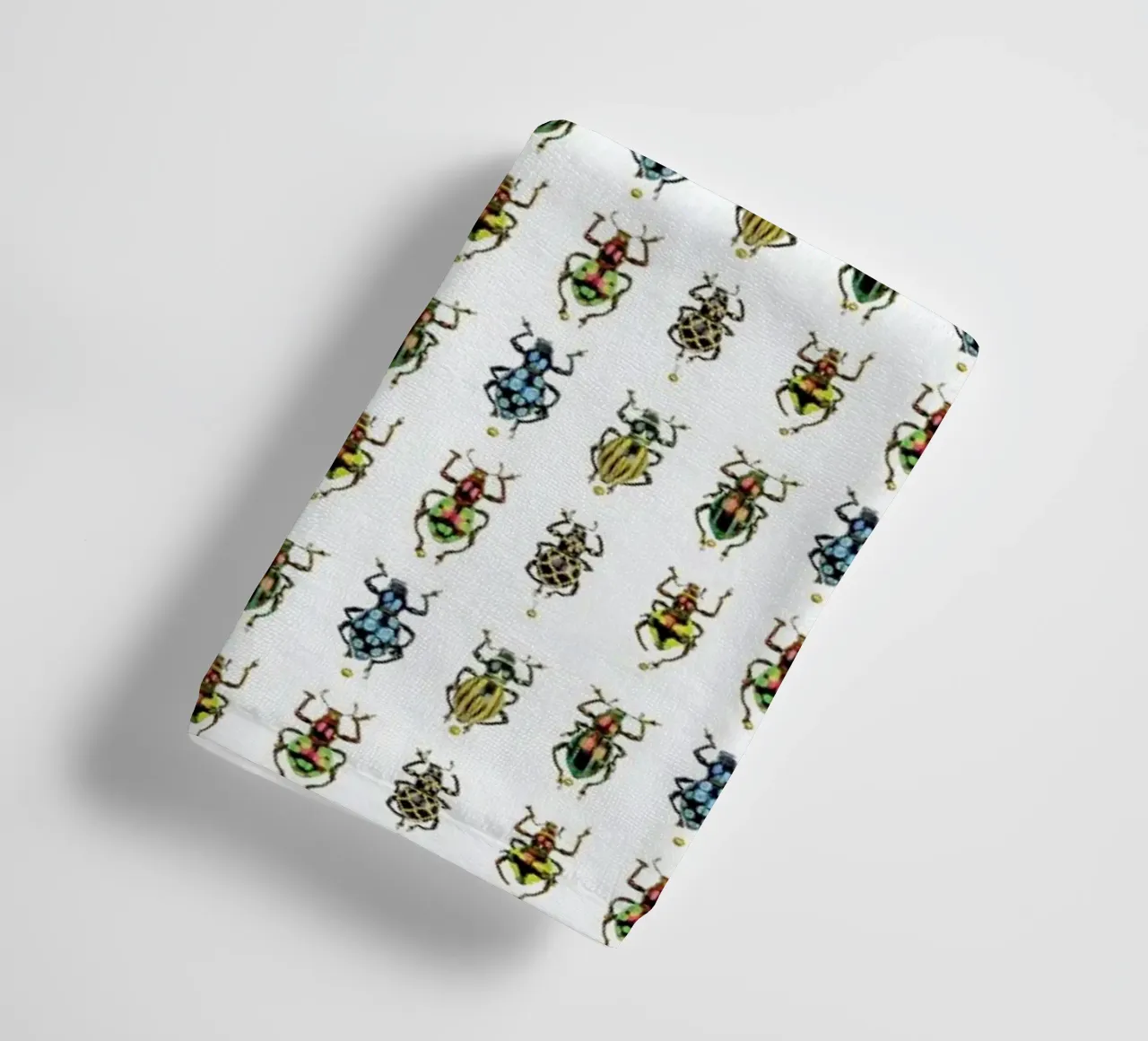 Tiny Beetles towel by Curious Collections by Marielle Leenders