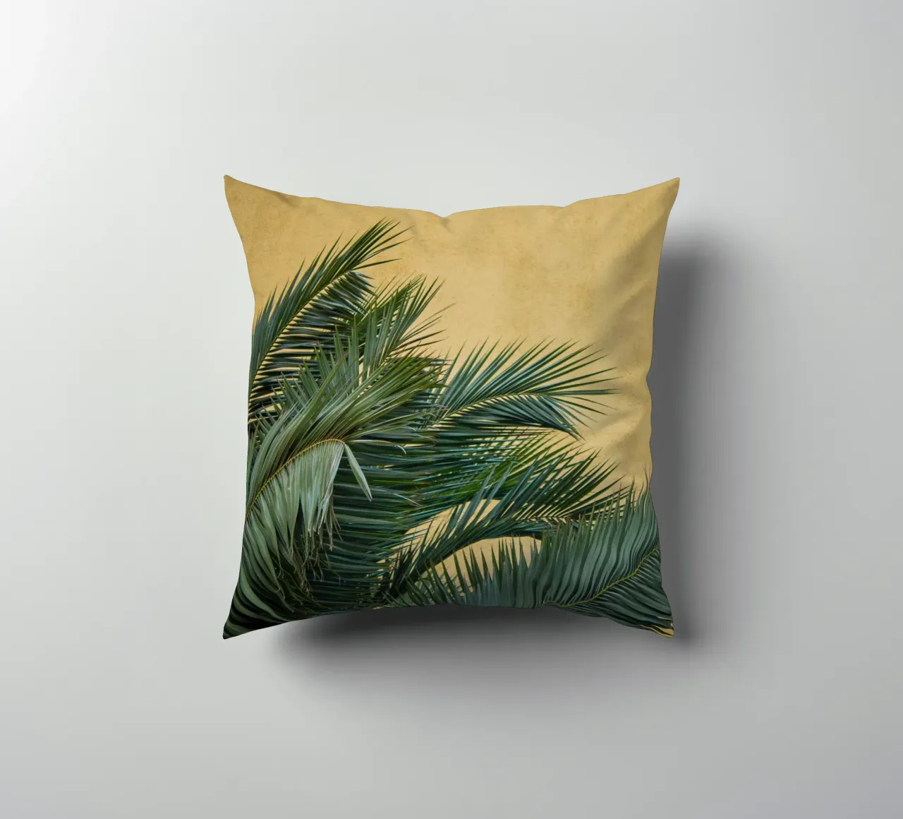 Golden Palm Leaves decorative cushion by Victoria Frost