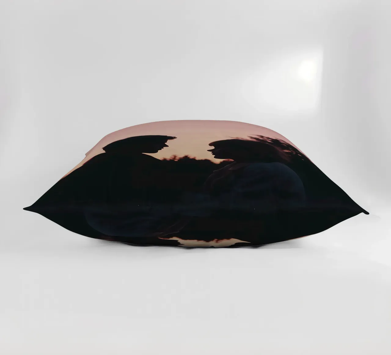 silhouette of a couple looking at each other decorative cushion by serinae