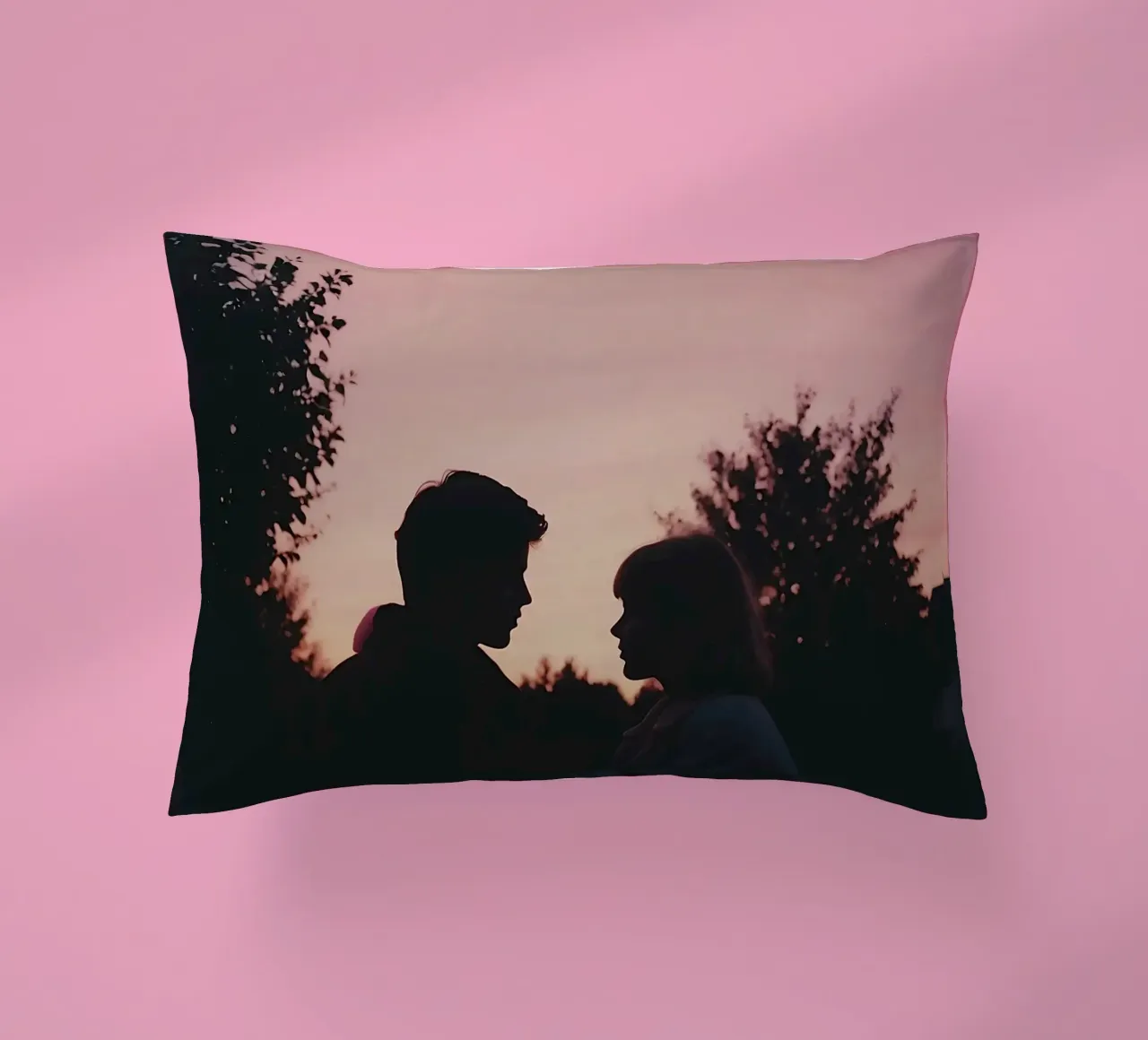silhouette of a couple looking at each other decorative cushion by serinae
