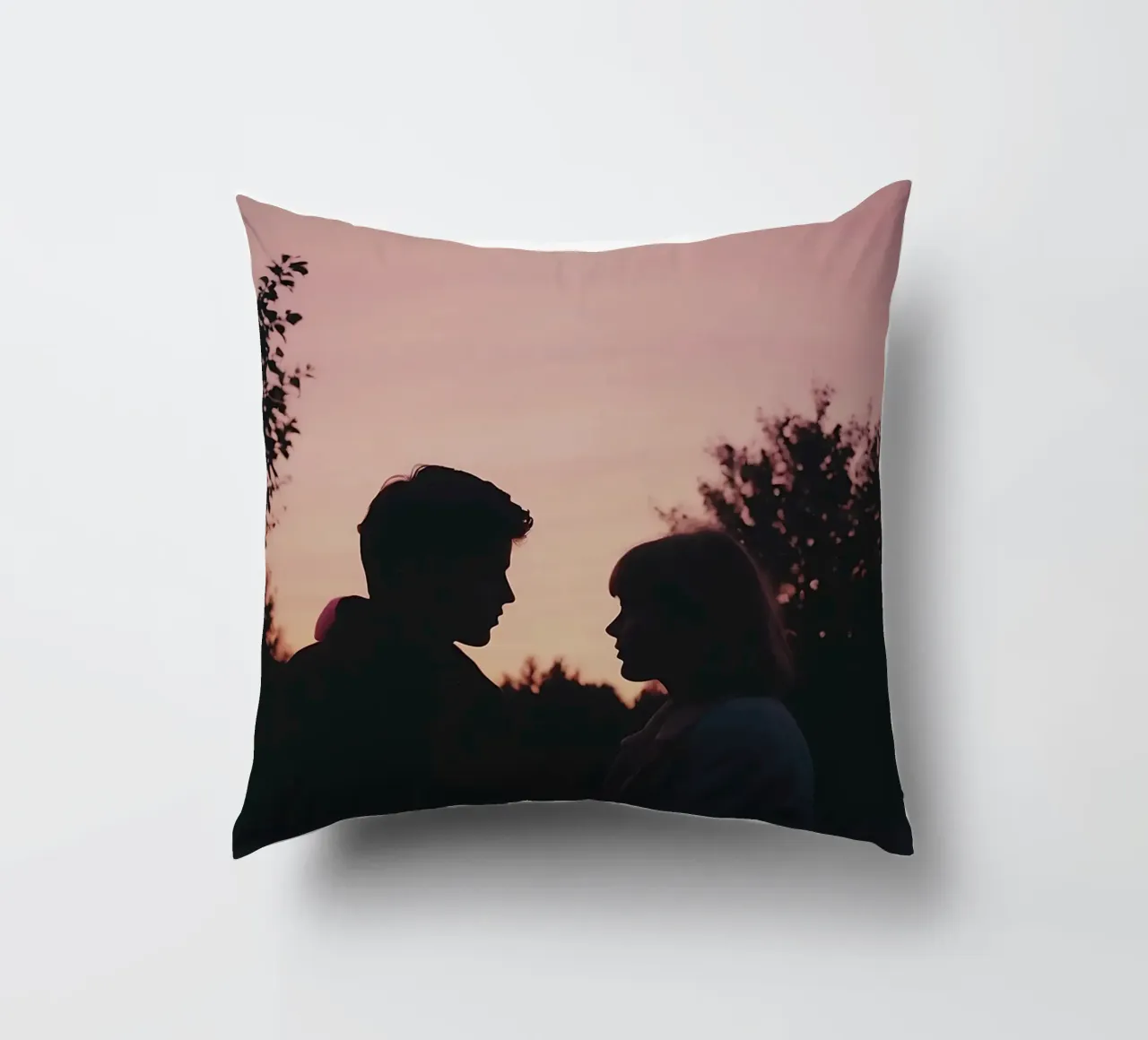 silhouette of a couple looking at each other decorative cushion by serinae