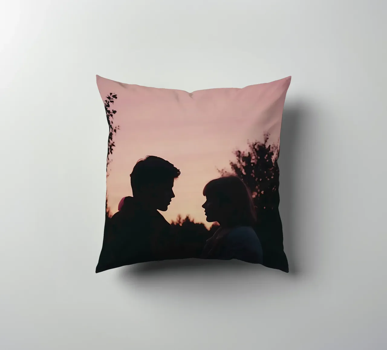silhouette of a couple looking at each other decorative cushion by serinae