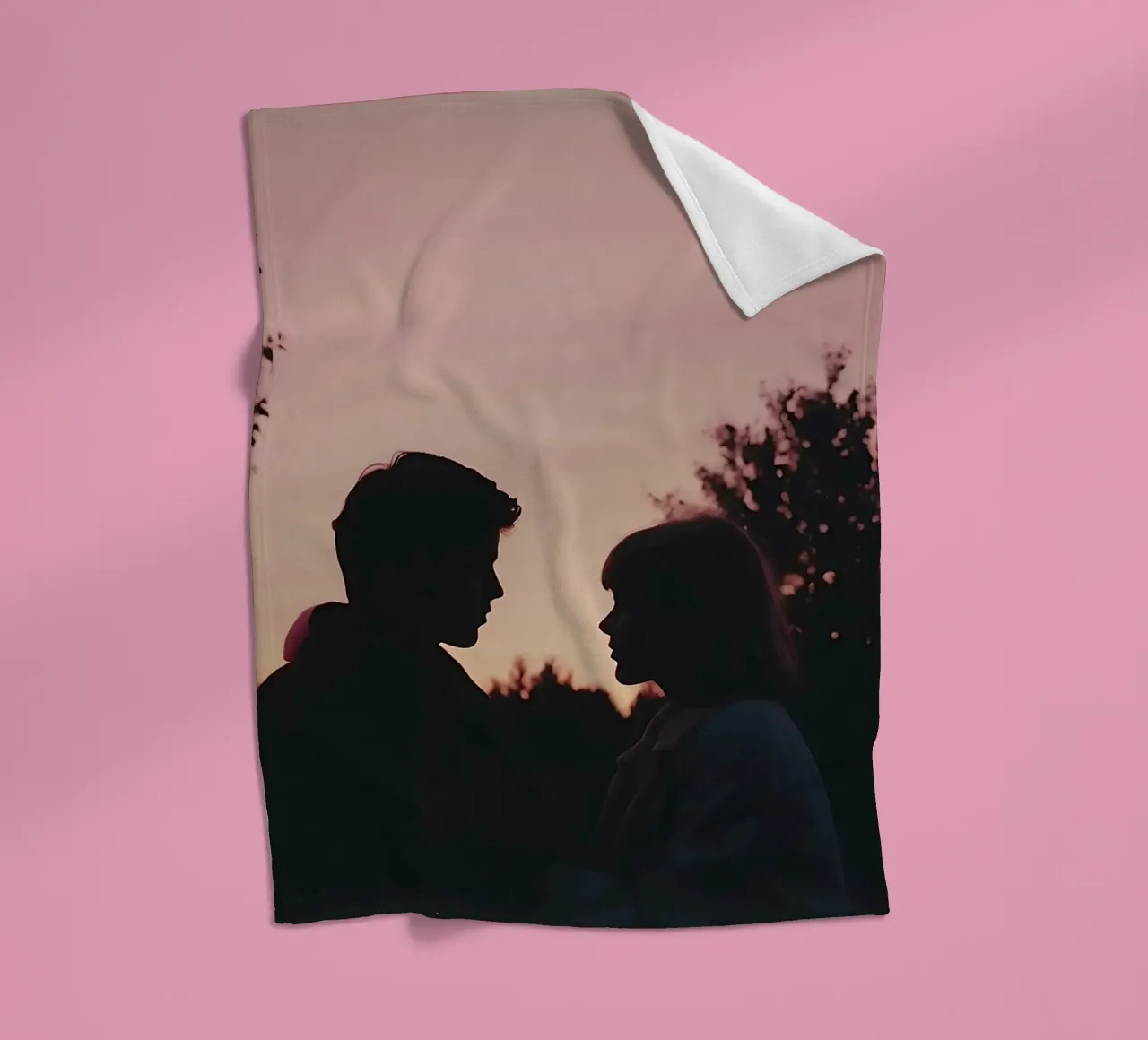 silhouette of a couple looking at each other fleece blanket by serinae