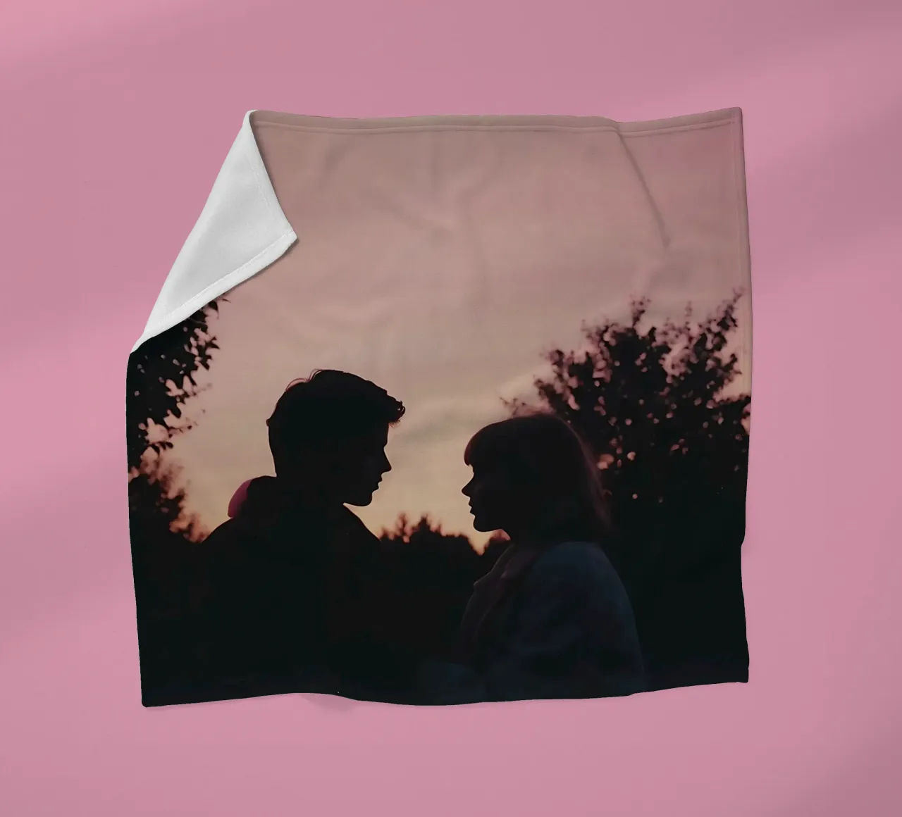 silhouette of a couple looking at each other fleece blanket by serinae