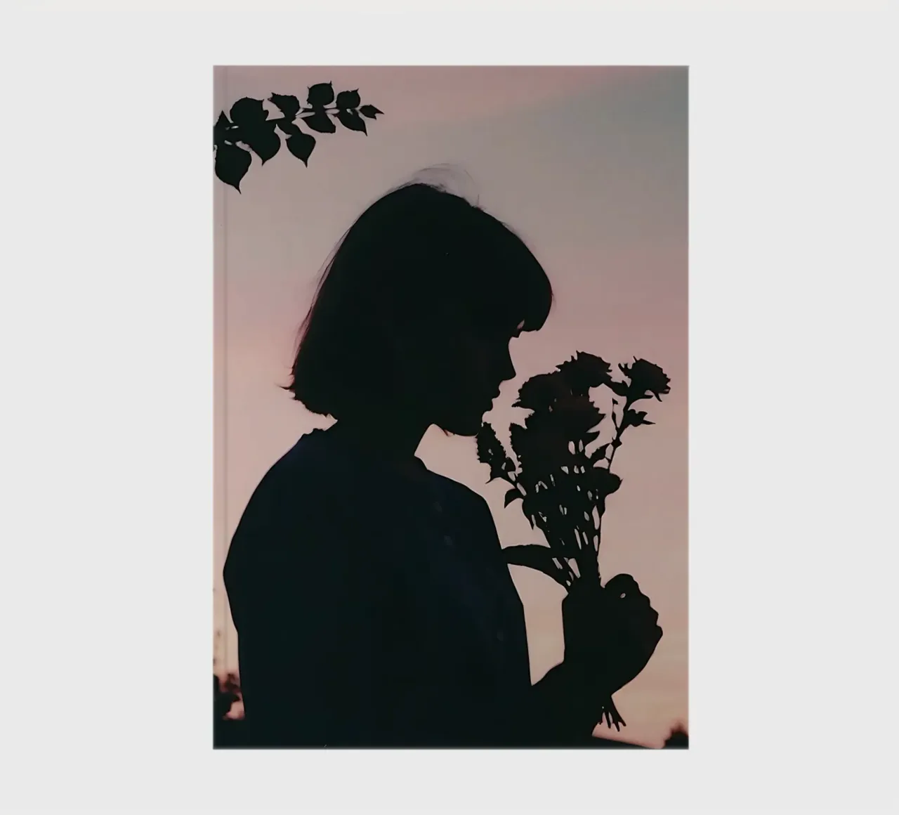 silhouette of a girl smelling a bunch of flowers notebook by serinae