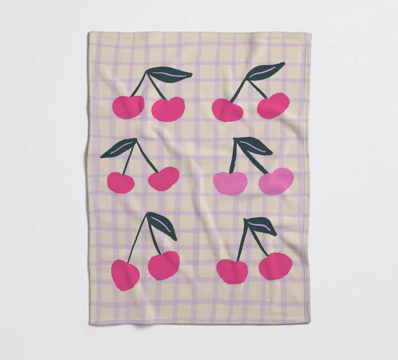 Abstract cherries on a grid pattern fleece blanket by Wackapacka