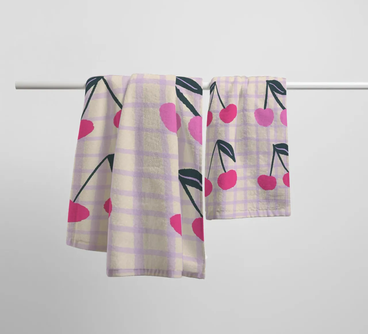 Abstract cherries on a grid pattern towel by Wackapacka