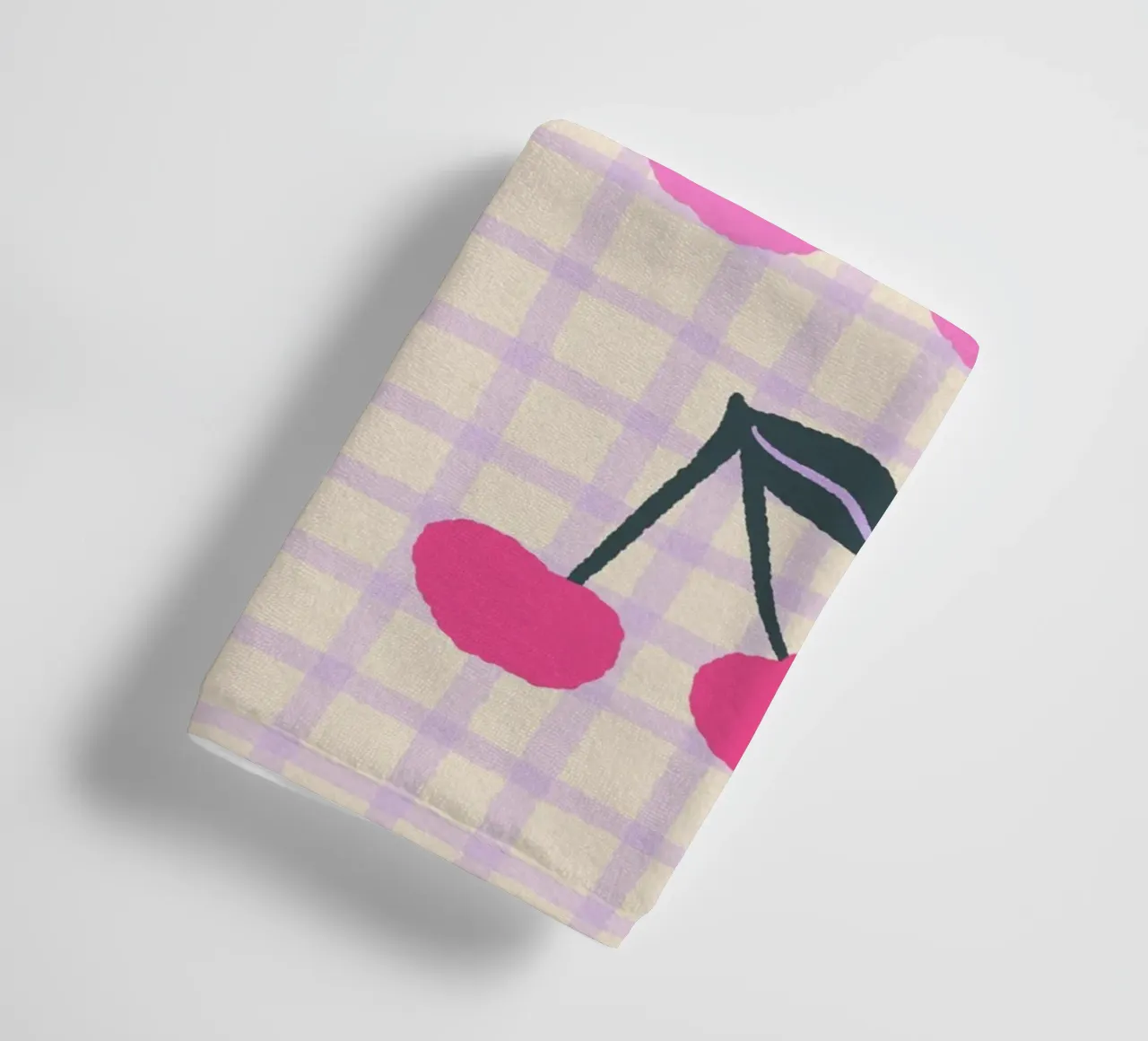 Abstract cherries on a grid pattern towel by Wackapacka
