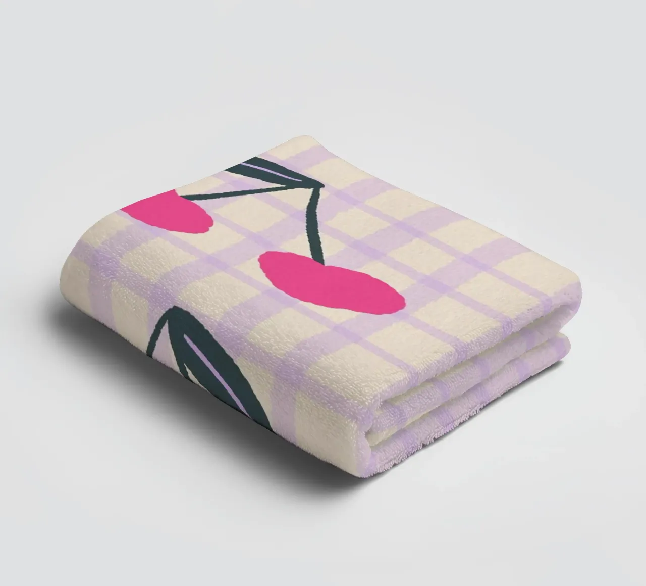 Abstract cherries on a grid pattern towel by Wackapacka
