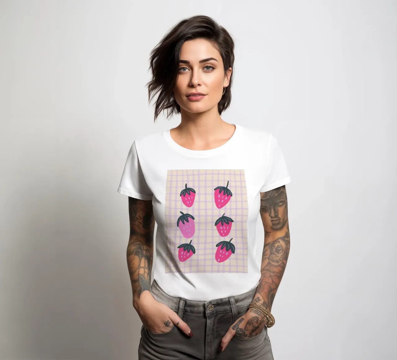 Abstract strawberries on a grid pattern women's fitted t-shirt by Wackapacka