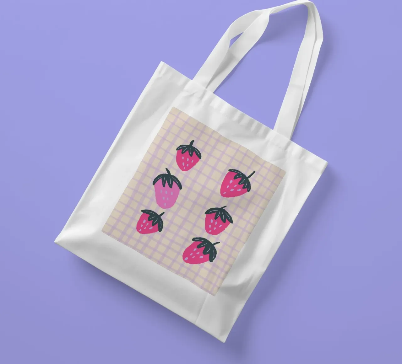 Abstract strawberries on a grid pattern tote bag by Wackapacka