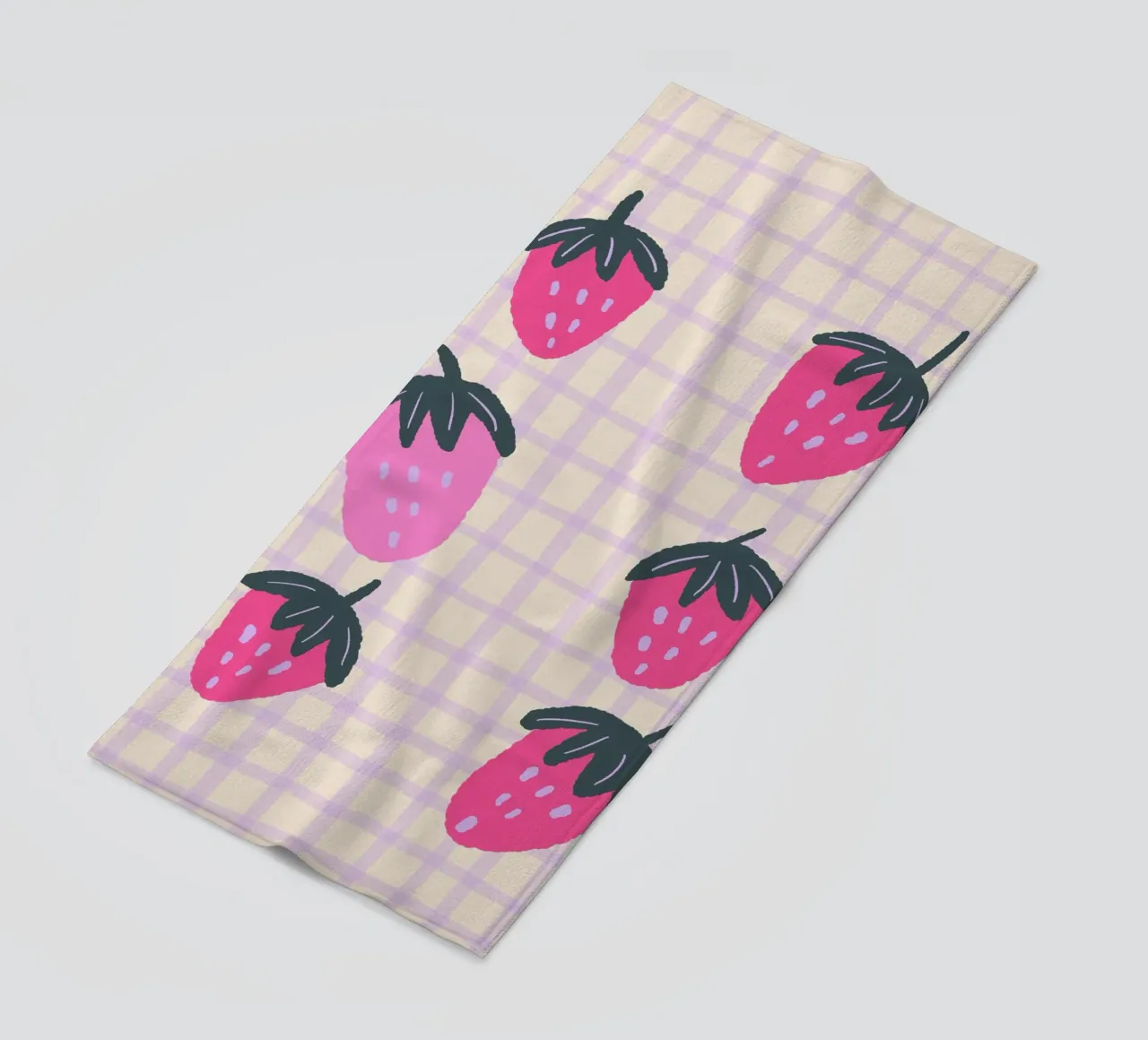 Abstract strawberries on a grid pattern beach towel by Wackapacka