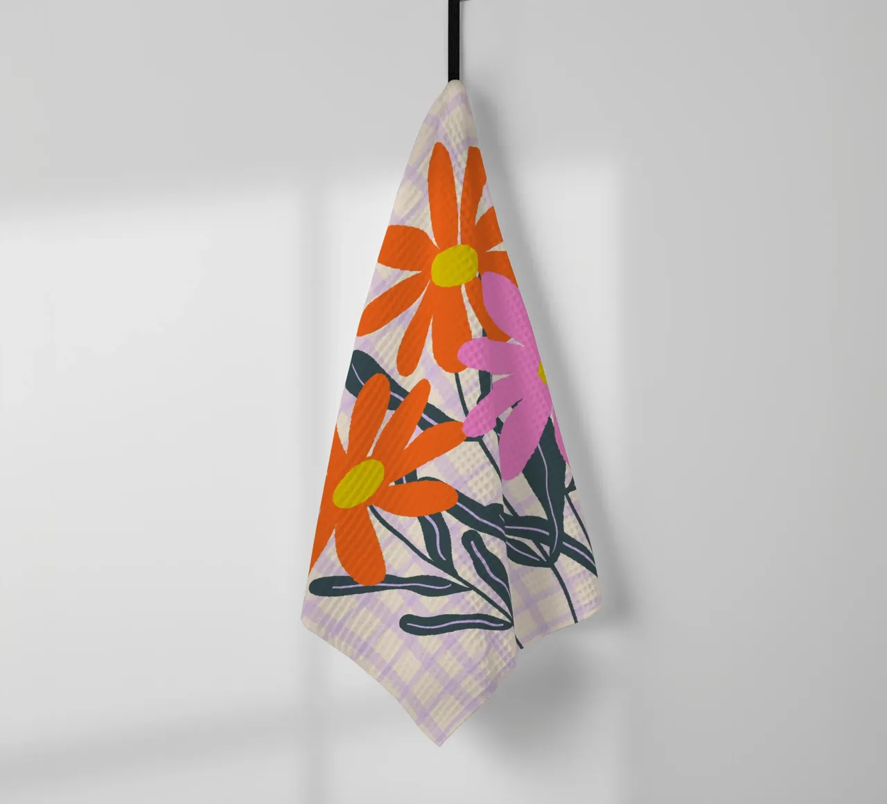 Abstract flowers on a grid pattern tea towel by Wackapacka