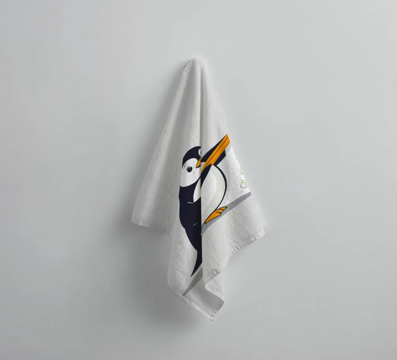A cartoon penguin drawing shapes and letters towel by DesignDoodle