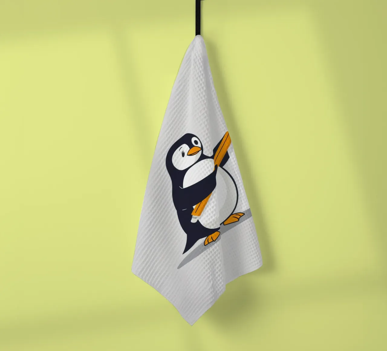 Un pingouin dessinant des formes et des lettres torchon de DesignDoodle