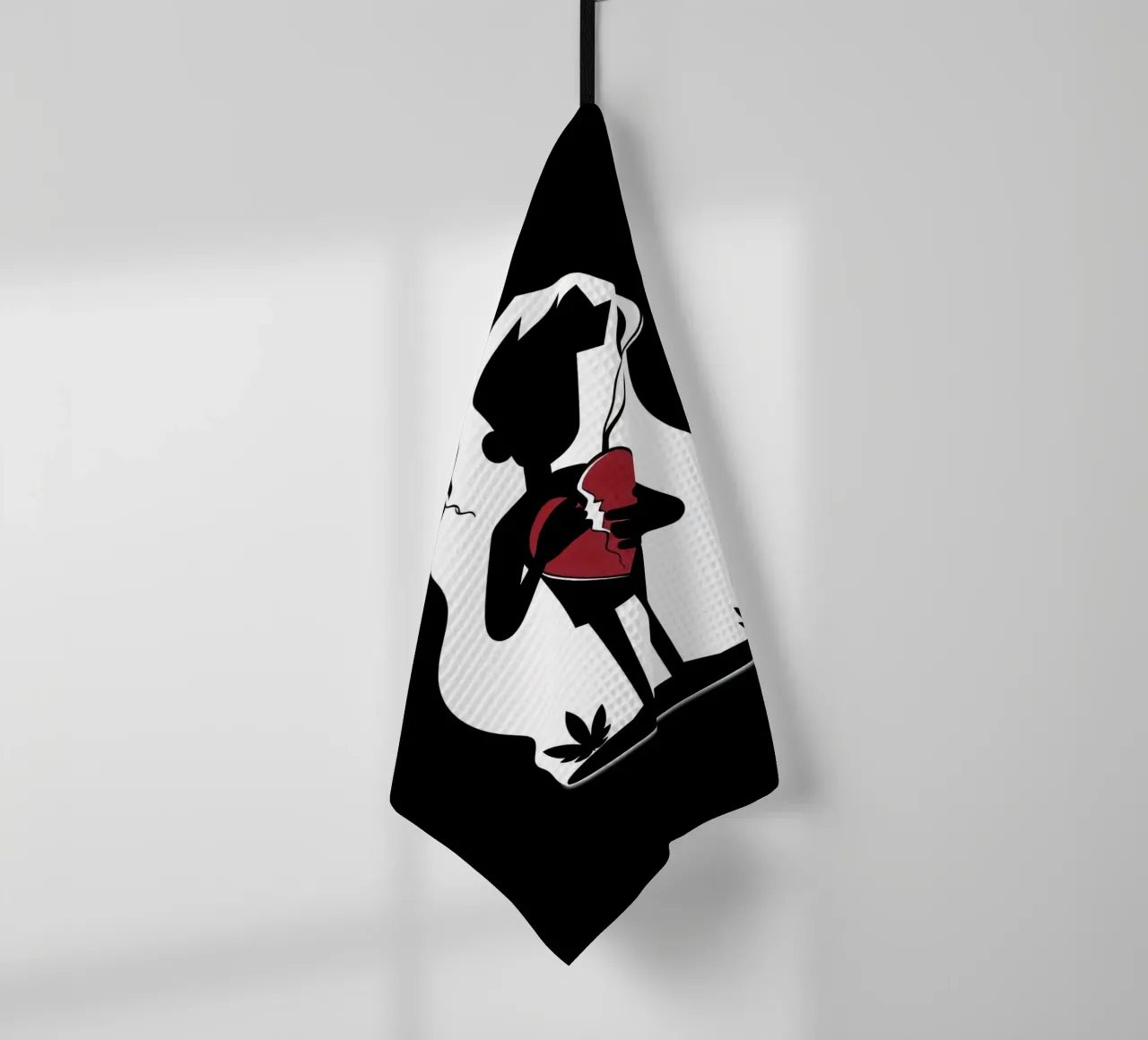 Una figura affranta tiene un cuore in frantumi canovaccio da cucina da DesignDoodle