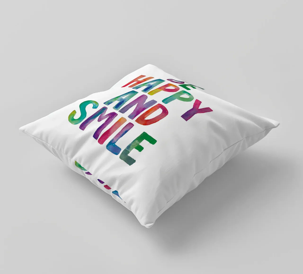 Design tipografico arcobaleno Be Happy and Smile cuscino da THE MOTIVATED TYPE
