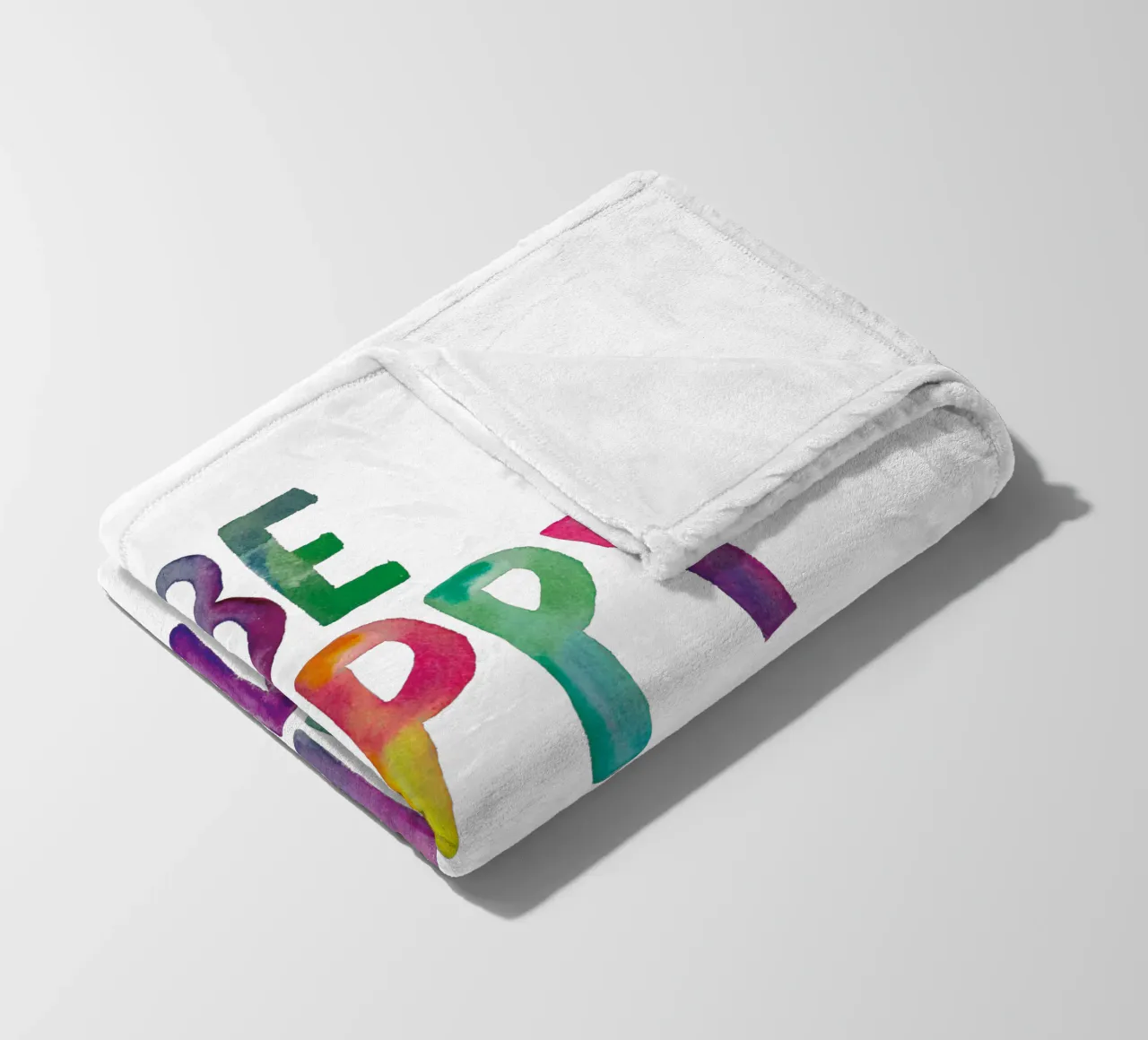Design tipografico arcobaleno Be Happy and Smile coperta in pile da THE MOTIVATED TYPE
