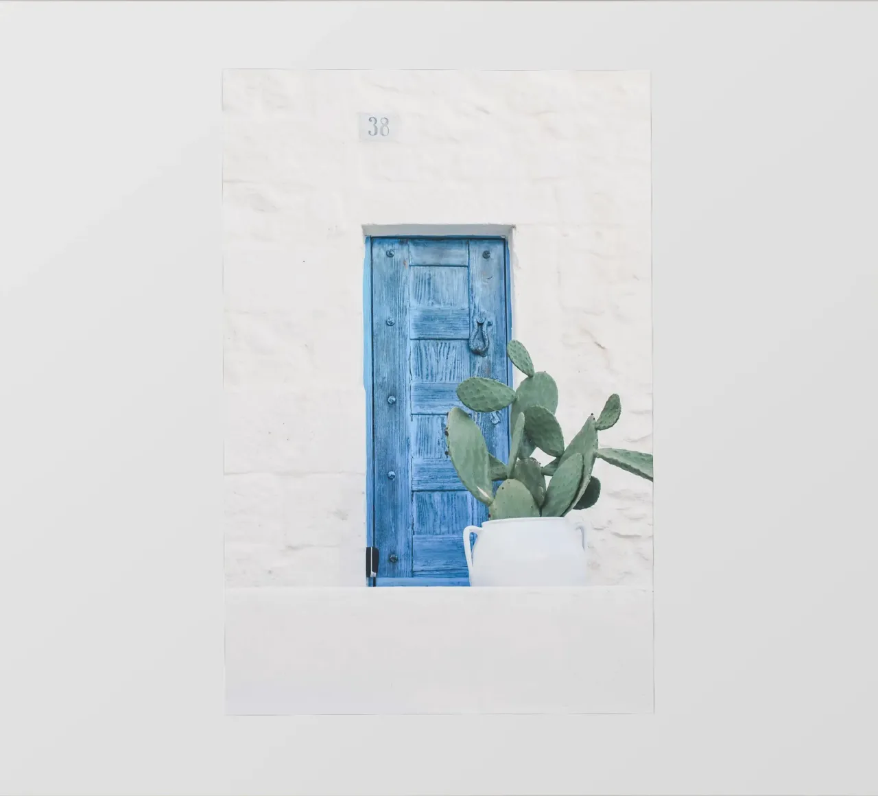 Puglia, Italy I Minimalist blue door and bohemian cactus pvc cover by Julie Travel Photography