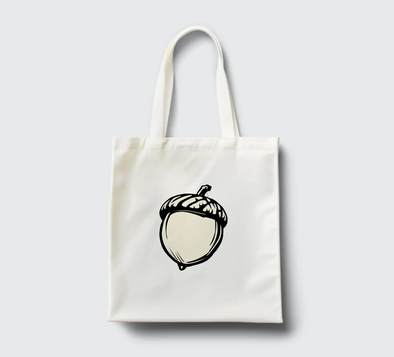 Illustrazione dettagliata di una singola ghianda in bianco e nero borsa in juta da DesignDoodle