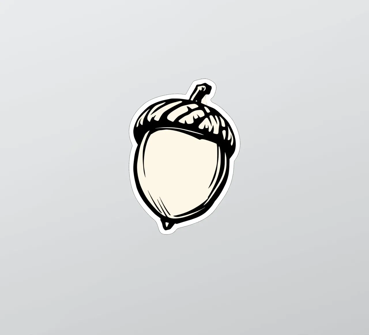 Detailed illustration of a single acorn in black and white sticker by DesignDoodle