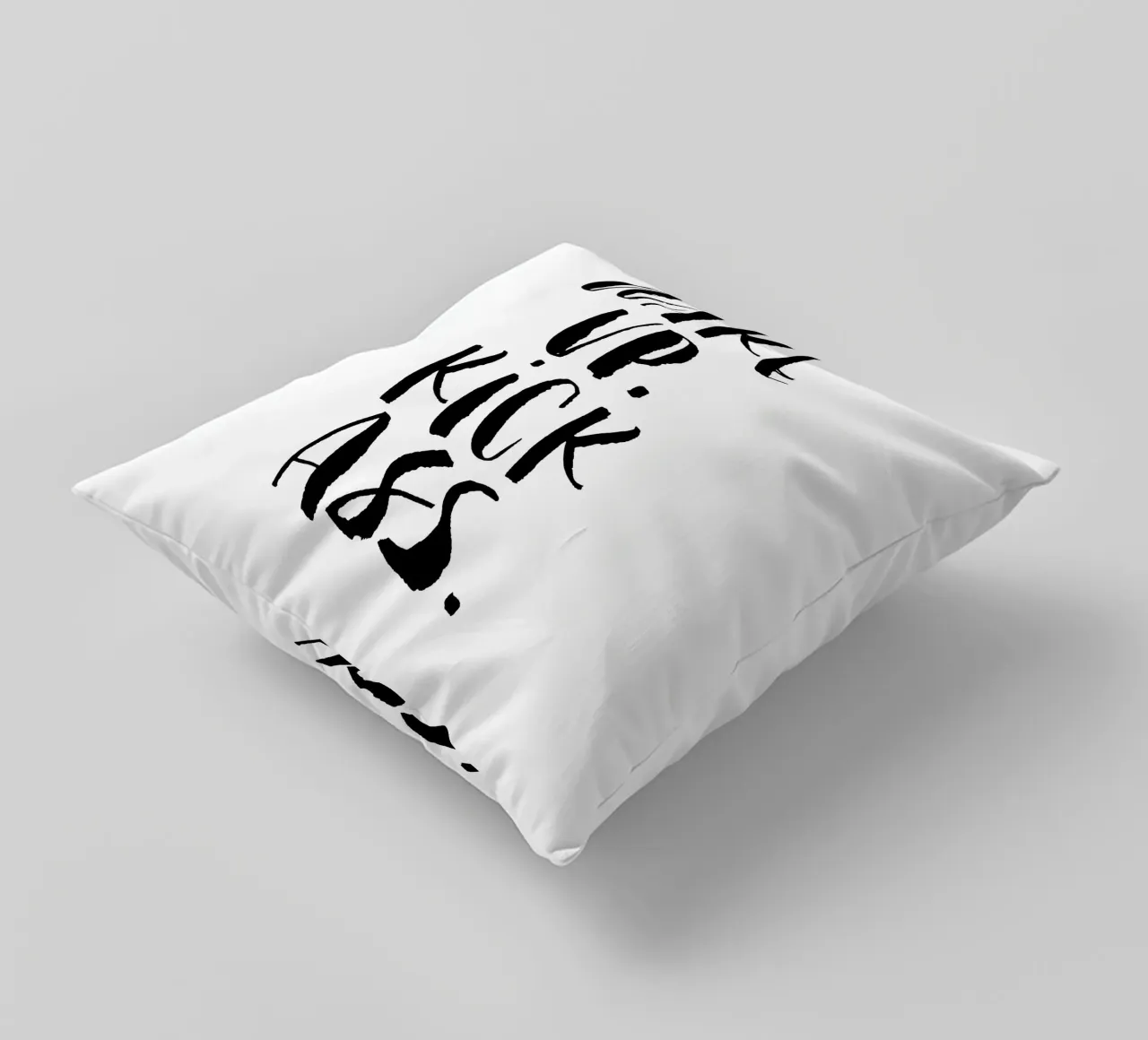 Wake Up Kick Ass: design tipografico in bianco e nero cuscino da THE MOTIVATED TYPE