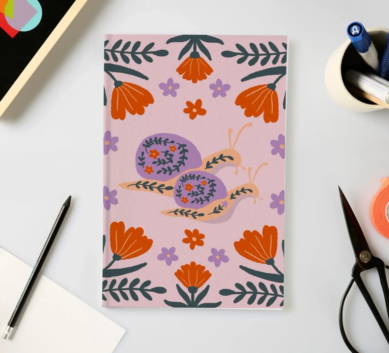 Lumache e fiori - viola e arancione diario da Wackapacka